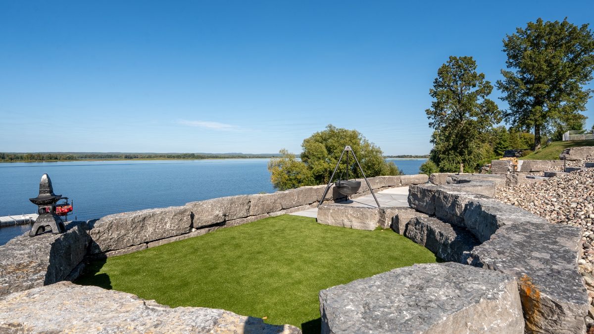 Stone patio and lakeside hardscaping details